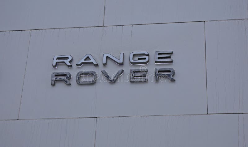 Logo Range Rover. SAINT-PETERSBURG, RUSSIA - January 13, 2015: company logo Range Rover at the Auto Show. Сult premium SUV from the company Land Rover royalty free stock image